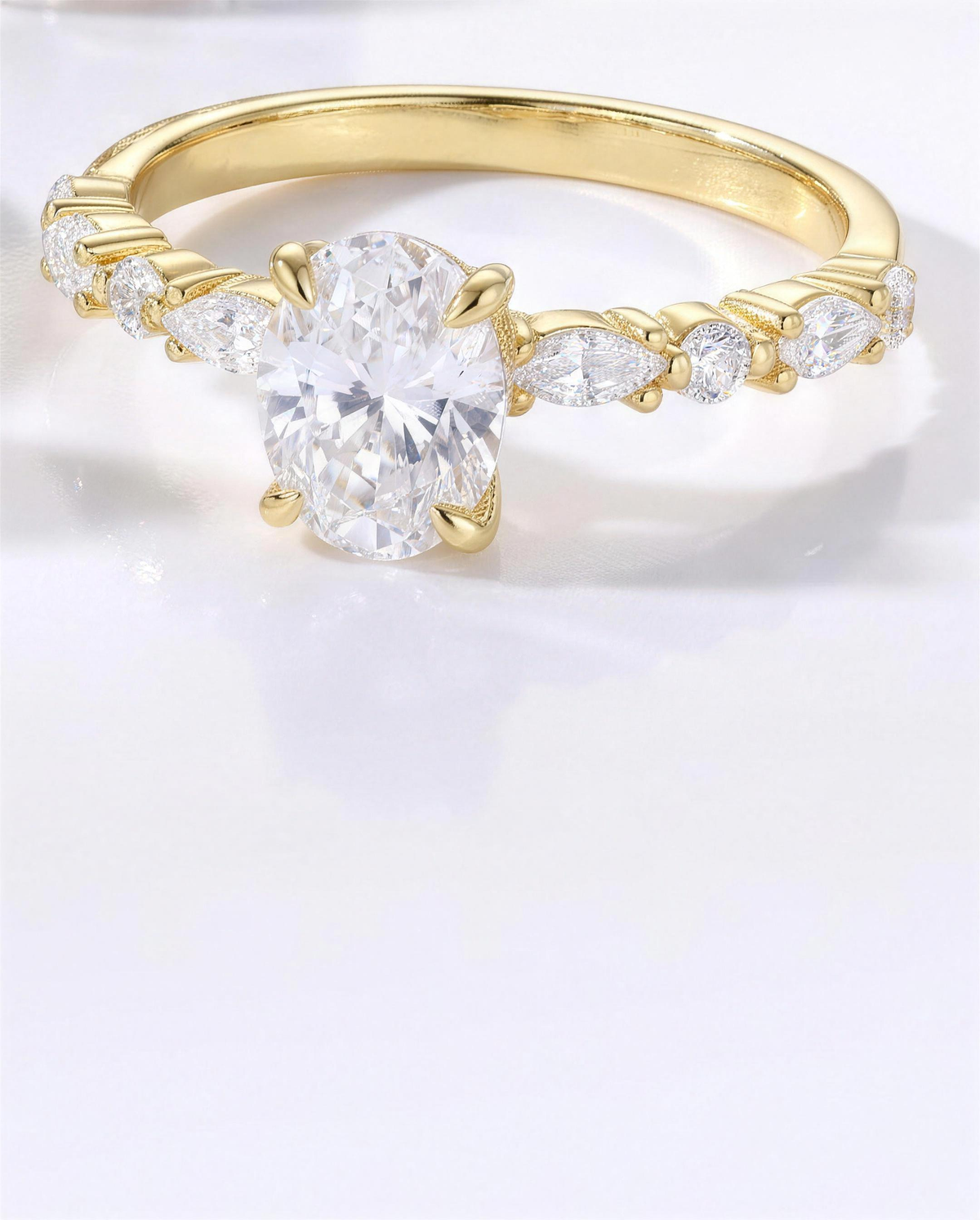 Giselle ring resting on a pale backdrop